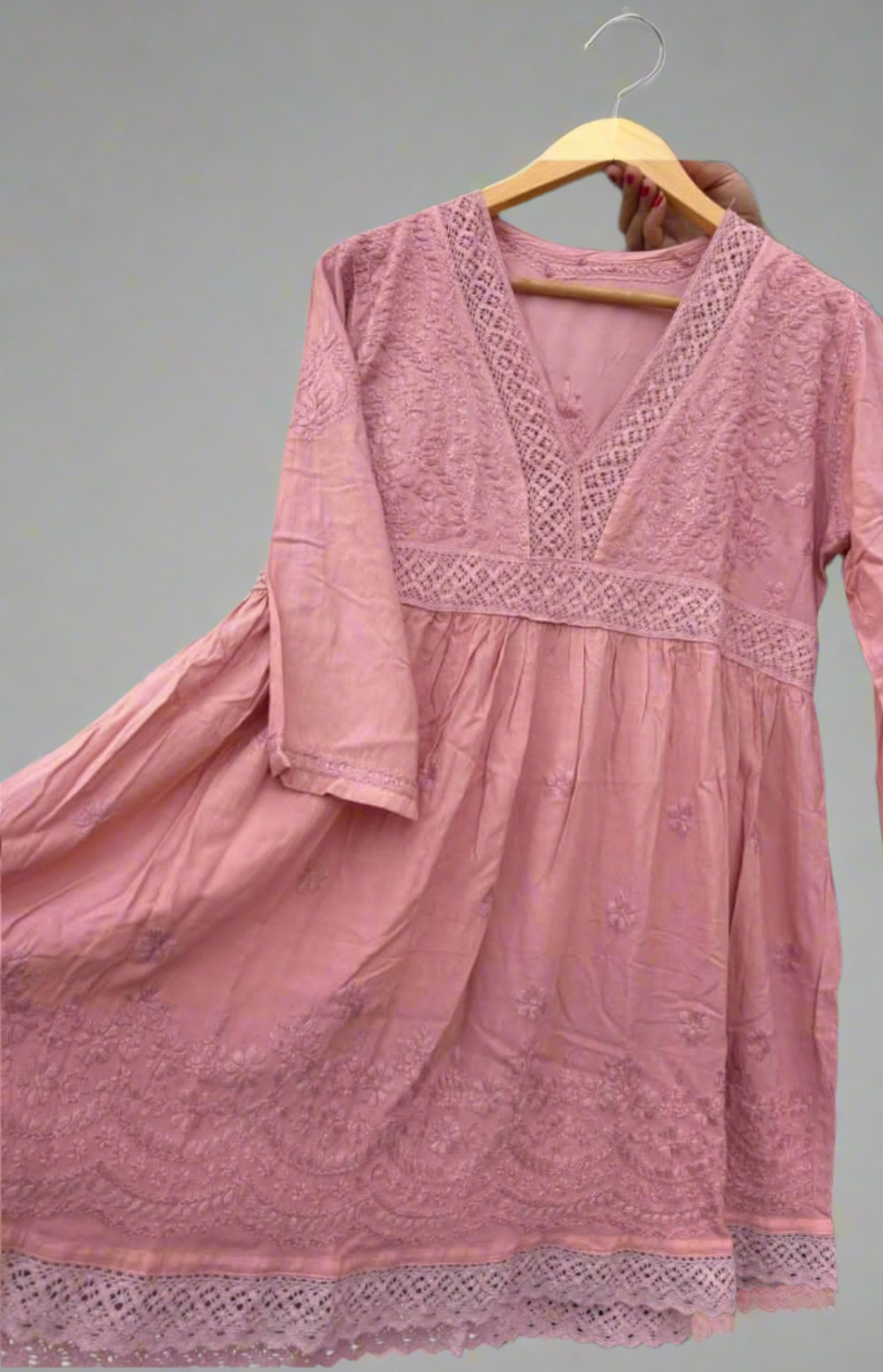 Rayon short dress/kurta with lace work.